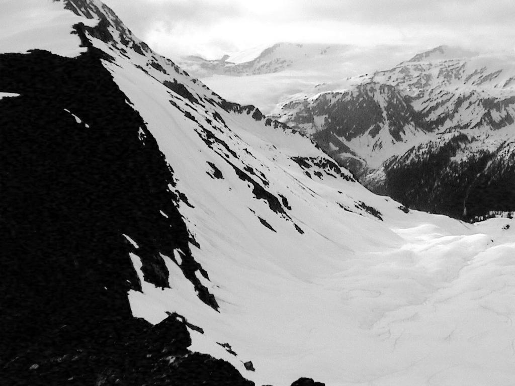 Durrand Glacier 310 m (1017 feet) 37 upper slope Chalet Uphill track June 19, 2003 Figure 3: Looking east at the approximate route taken up the La Traviata couloir by the SME touring group.