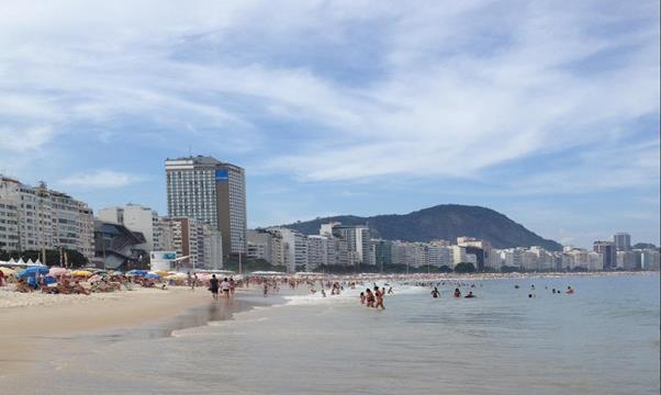 4B - An image of a beach which shows a large number of buildings developed along the coastline.