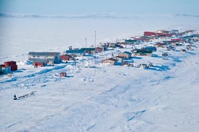 shaktoolik Population: 199 One look down the street at the snowdrifts will tell you this is one of the windiest stretches of the trail.