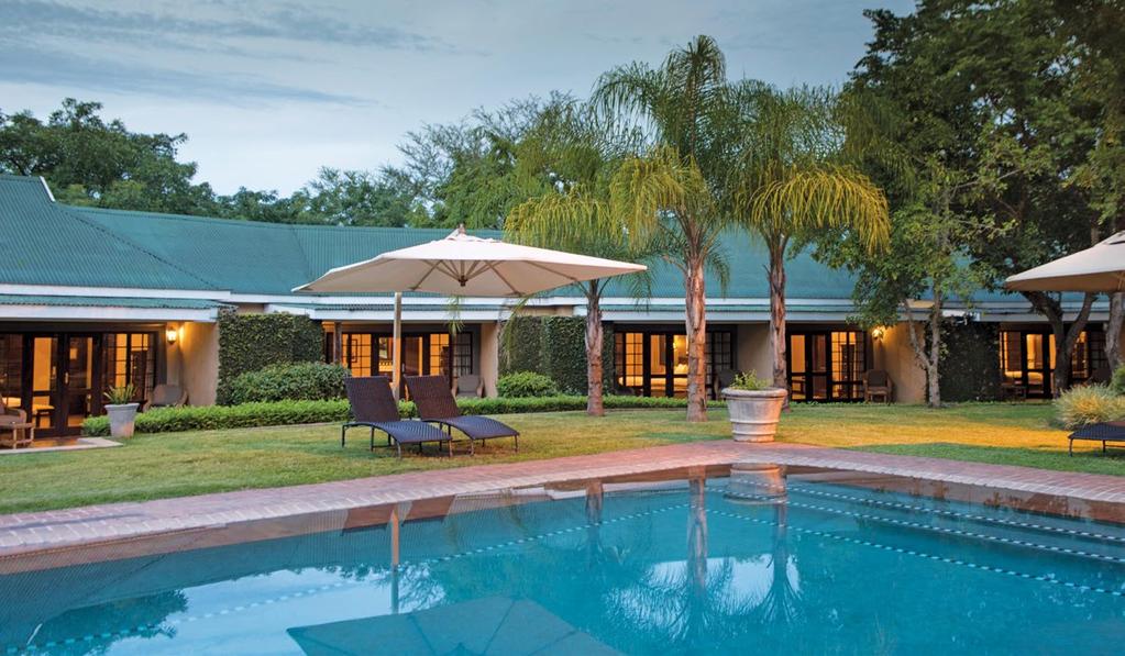 Perry s Bridge Hollow Boutique Hotel is situated outside Hazyview at the colonial Perry s Bridge Trading Post, Mpumalanga.