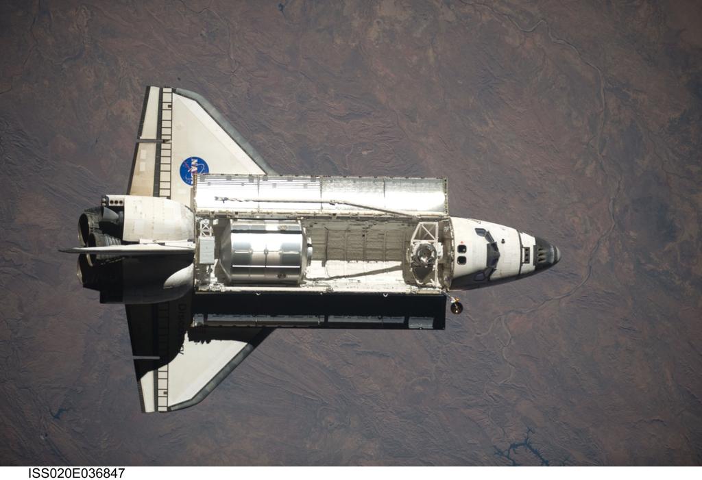 Space Shuttle Approaching the ISS with a Multi Purpose