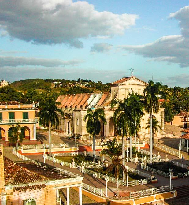 TRINIDAD Trinidad is a small town in the province of Sancti Spíritus, central Cuba.