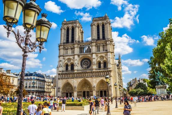 Facts: A UNESCO World Heritage Site Notre Dame is a Gothic cathedral on the Ile de la Cité It is the symbolic heart of the city and the country Its construction begun in 1163 by Paris' bishop,