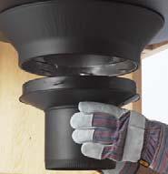 Then, from beneath the support, insert the stove pipe adapter and twist-lock it into place. 6. Now, you can add additional chimney sections.