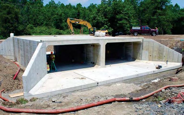 are corrugated steel pipe-arch structures, each approximately 3 m wide and 2 m high These three culverts could potentially be