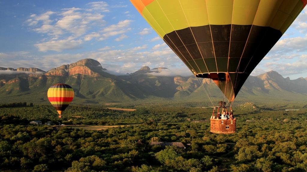 Day 7: Saturday, July 21 This morning we will get up early and enjoy a sunrise hot air balloon ride over Kruger National Park. We ve enjoyed many busy days in South Africa thus far.