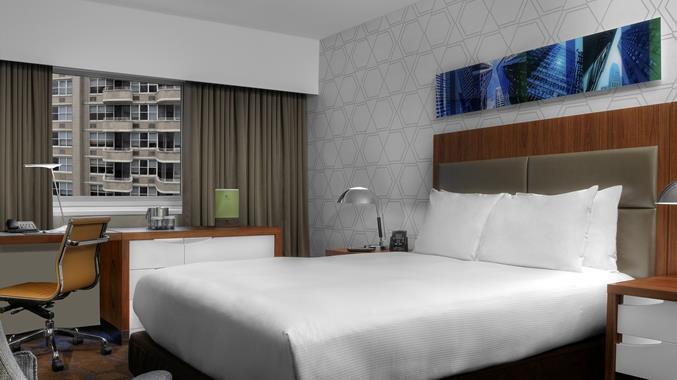 In-room amenities include 37-inch flat screen TVs, cordless telephones and work desks amidst contemporary, sleek decor.