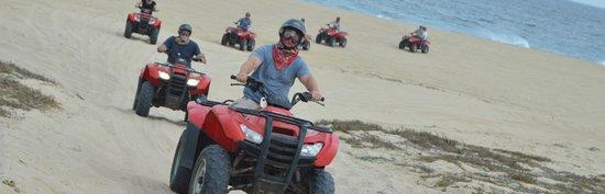 Migriño ATVs Tour by the beach Enjoy the beauty of nature driving through the desert, mountains, canyons, a huge dry stream and a beautiful beach with sand dunes and spectacular ocean side cliffs.