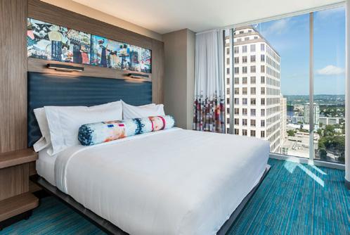Guest rooms at Aloft feature free and fast Wi-Fi, ergonomic workstations, Bliss Spa amenities, Flat-screen TV, free bottled water and coffee, mini-fridge, one King or two Queen sized beds and some