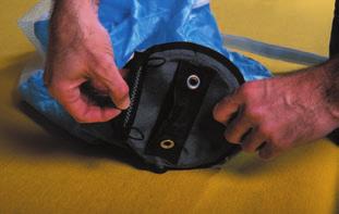Compressing the Pilot Chute 1. Insert the soft cone loops into the soft cone pocket. Secure the soft cone pocket with a double turn of red safety seal thread.