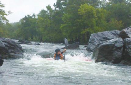 (Lower Mountain Fork Continued) I took on quite a bit of water at one point but Christina actually capsized twice.