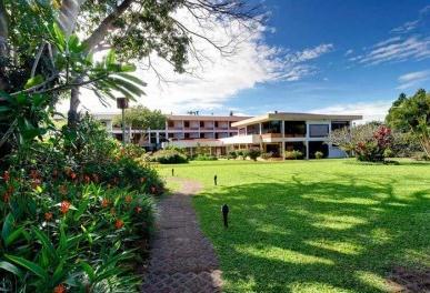 Set among ten acres of lush gardens, the unique and comfortable Hotel Bougainvillea, located at the outskirts of a pleasant residential area in San Jose, provides a quiet hideaway where guests can