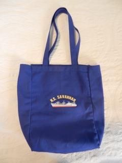 front of the bag. The name of the ship appears below the picture. Embroidered; $20.