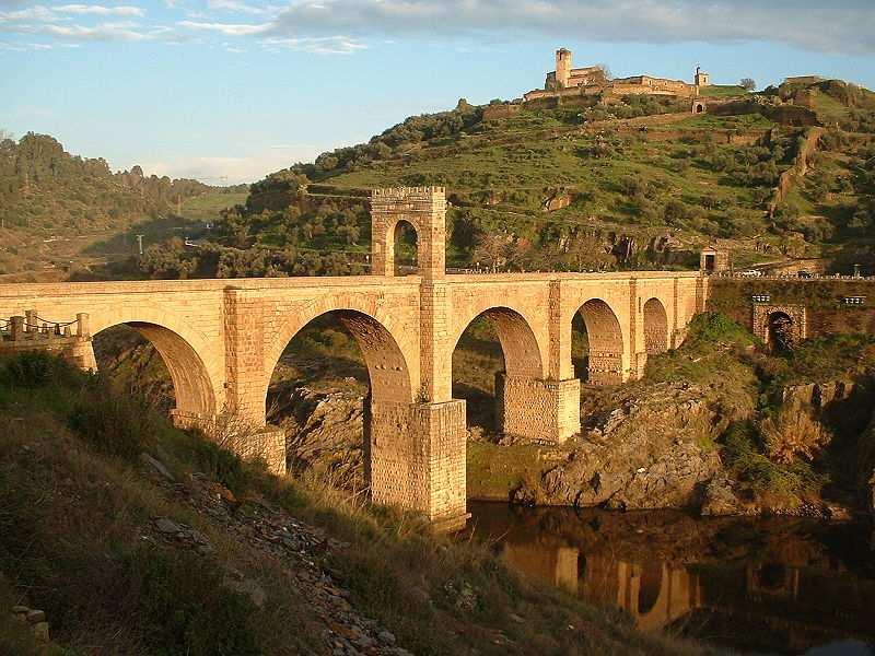 Name: Alcantara Roman Bridge. Situated: Alcantara, Extremadura. Date: Built in AD 105-106.