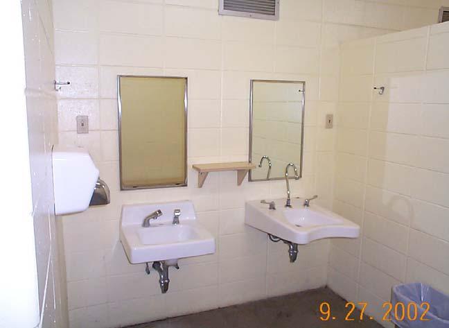hooks (Tables 3.4 and 3.5) Photo K-8. Shower stall. Redman Creek Campground, Wappapello Lake, MO.