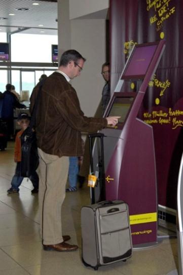 The Application guides the passenger to place bag to the belt 5. The System determines weight and size 6. The System prints baggage Tag 7.