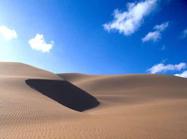 23 The golden sand dunes are in constant change, at the mercy of the winds, and the quality of the sunlight Rissani From Rissani to Merzouga Crossing black desert, red dunes, and the blue waters of