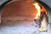 - For larger ovens, 950 and bigger, it is possible to have 2 fires, one on each side of the oven, burning at the same time. Ensure multiple fires do not result in over firing the oven.