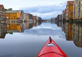 kayaking on the River Nid and into the city s smaller channels, or a casual walk or bicycle ride among the beautifully restored wooden buildings in the Bakklandet