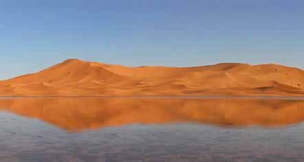 Merzouga In Merzouga, you will see the first dunes, undisturbed sand hills, infinite spaces subject to the sun and wind.
