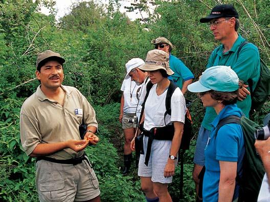 Representing the entire Galápagos team are: Naturalist Carlos Romero at left; Expedition Leaders Lucho Verdesosto, Lynn Fowler and Emma Ridley above.