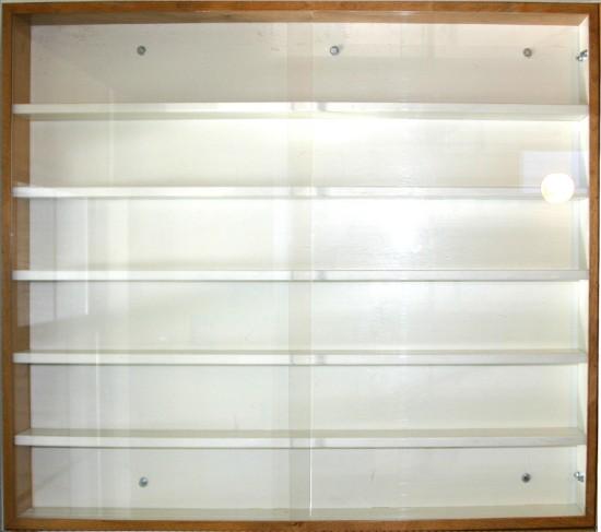 The shelves and backing are painted semi-gloss white.