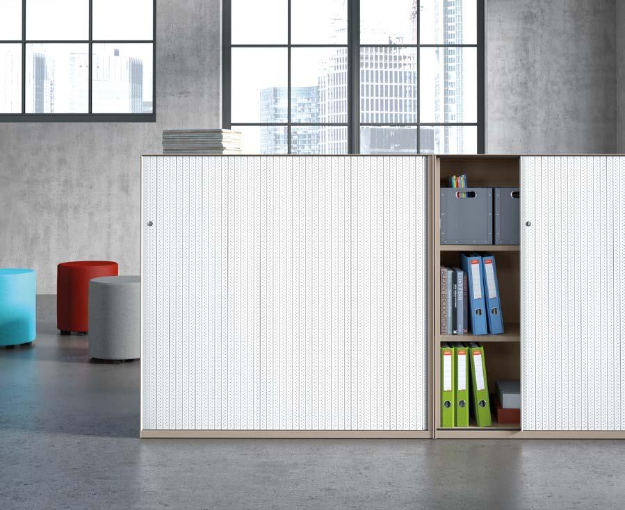 SYS CABINETS F U L L - L E N G T H, E L E G A N T P R O F I L E H A N D L E AN OFFICE FOR QUIET WORK THE ATTRACTIVE LARGE PERFORATIONS OF THE SYS SLIDING DOOR CUPBOARDS,