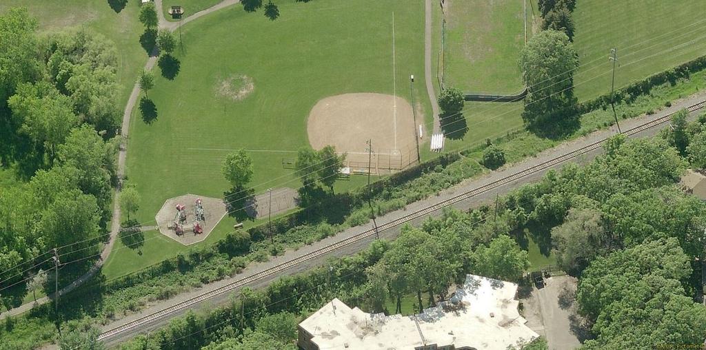 Lee Park viewed from the west showing fence line between the park and the railroad corridor Alignment D1 Sochacki Park is situated between 26th Avenue and 34th Avenue in Robbinsdale.