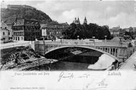 (Citat: Zmajski most; Gorazd Humar; Nova Gorica 1998) Arhitekt: Jurij Zaninovich Gradbeni izvajalec: Pittel&Bransewetter Z začetnimi deli so pričeli 1. julija 1900.