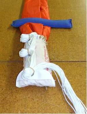 Use 2 parachute type bands for all diaper stows.