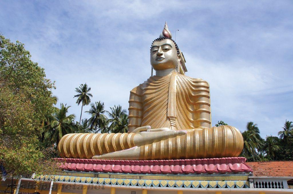 WEWURUKANNALA BUDDHA STATUE The Wewurukannala Vihara is dominated by a seated Buddha statue.