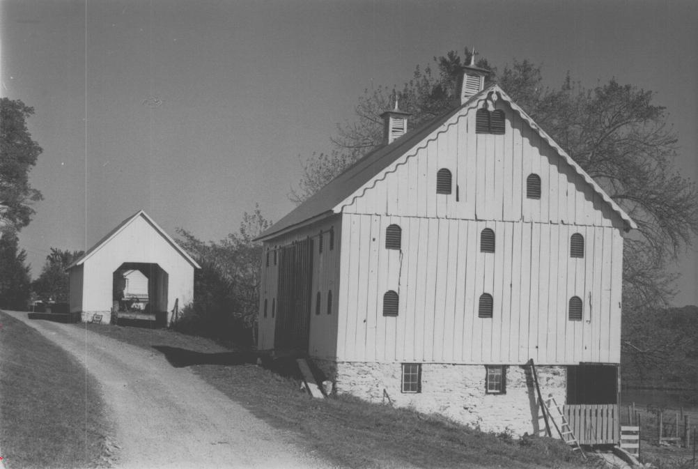 Name Number 7 Page 3 Bank barn, right, and corn crib.