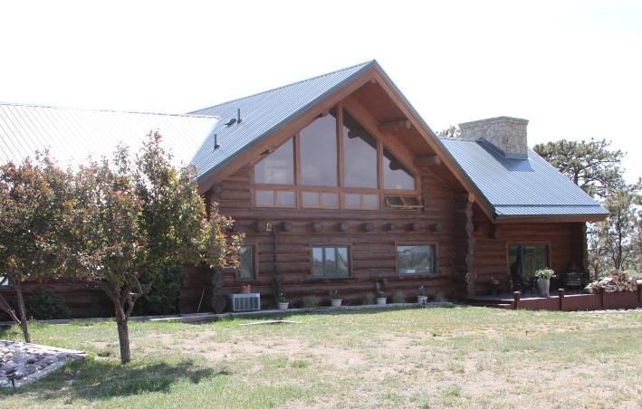 Ponderosa Pines Ranch AGENTS NOTE: This ranch consists of 3,100+/- acres. plus 640 acres state land. The hand hewn custom log home has a wrap around, multi level deck, heated pool, hot tub and sauna.
