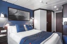 conditioning, telephone, bathrobes, and private shower and toilet. The four-deck vessel has ample deck space and is well-served by two restaurants.