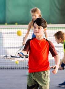 Players use racquets sized for small hands and, while playing on a small court, use slower balls that are easier to hit, building confidence in their game.