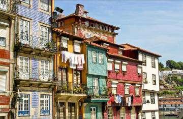Oporto and the North Built on the steeps of the Douro river that divides the city, Porto is much more than the centre of the Port wine industry.