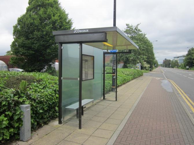 Eastbound bus stops, comprising of flagpole, information sign and shelter, are provided to the west of the junction with Sir Alex Ferguson Way, along the Quay West office frontage and along the