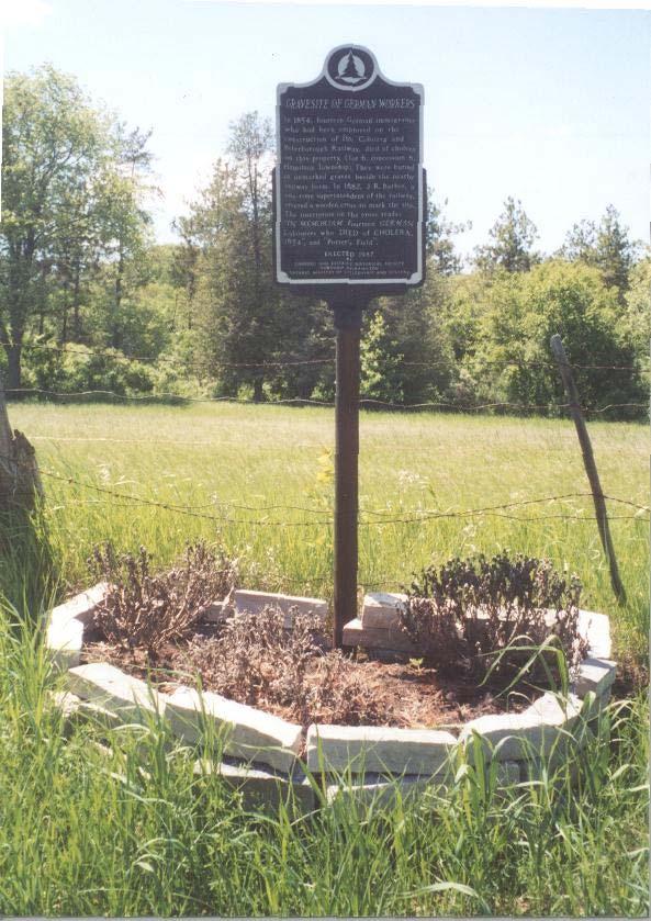 4. Located on the Harwood Rd Bearing the Township of Hamilton Pine Tree Logo GRAVE SITE OF GERMAN WORKERS In 1854, fourteen German immigrants, who had been employed on the construction of the Cobourg