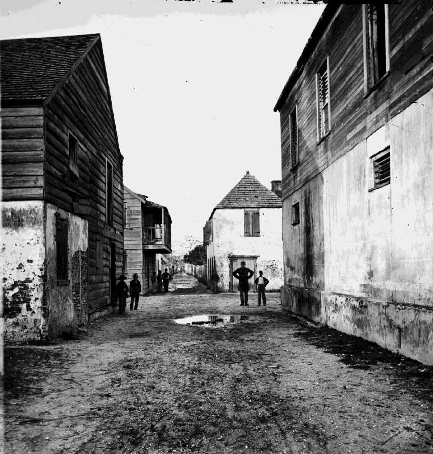 In 1585 St. Augustine, Florida was founded. This photograph shows a street in St. Augustine, Florida. This image was taken circa the 1860s by Samuel Cooley.