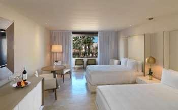 Suite Type: Max Capacity: Primary View: Code: Family Concierge Garden View Suite 2 adults and 2 children or 3 adults and 1 children Garden S4T Above image belongs to a different room type.
