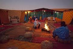 Switching to camels, trek into the vast and silent Sahara, to a Berber camp for overnight THE CAMP On