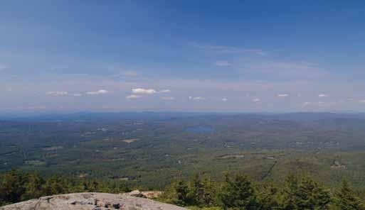Hello, Vermont! A view from the summit of Mount Kearsarge can do. More adventurous souls may want to explore the shoreline of the pond.