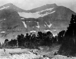 Circa 1930, G Ruhle, GNP Piegan Glacier circa 1930-1998 In the photograph pairs of Piegan Glacier there are two changes.