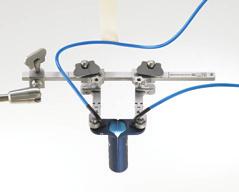 Turn the Ratcheting Key on the Pivoting Arm counter-clockwise if the Counter Retractor is attached to the Left-hand side of the Base retractor.