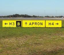 Remember: RED and WHITE RUNWAY in SIGHT. 3. Location Sign Identifies the taxiway you are currently located on. It has a yellow inscription on a black background.