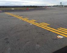 Inset Taxiway November/Charlie runway guard lights are inset due to the width and complexity of the taxiway.
