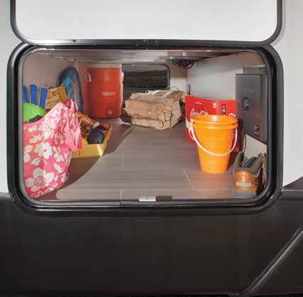 FULL PASS-THROUGH STORAGE ENCLOSED & HEATED UNDERBELLY Store all your camping gear and road-side souvenirs inside the convenient and ample-sized full pass-through storage area, complete with slam