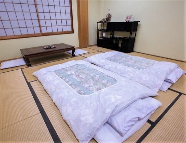 Minshuku are usually family-run. They have tatami-mat rooms, with futons laid out in the evening for sleeping.