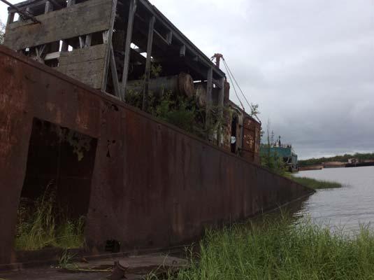 Complaints regarding the storage began when vessels were left to sink, some started polluting the river and the abandoned vessels started interfering with use of the Slough year round.