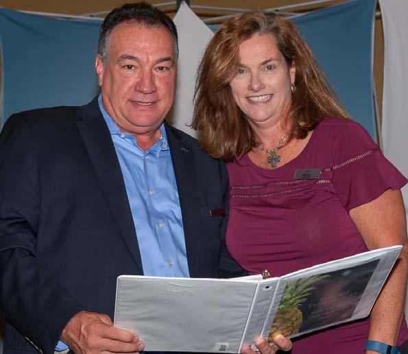 Frank Quallen, General Manager of the Renaissance Orlando Airport Hotel, and Melissa Jean, Director of